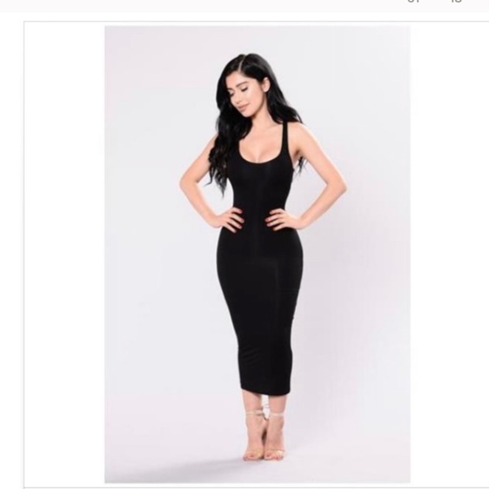 Black stretch bodycon dress. ✨
